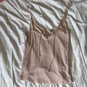 Aeropostale light pink tank top with lace up detail